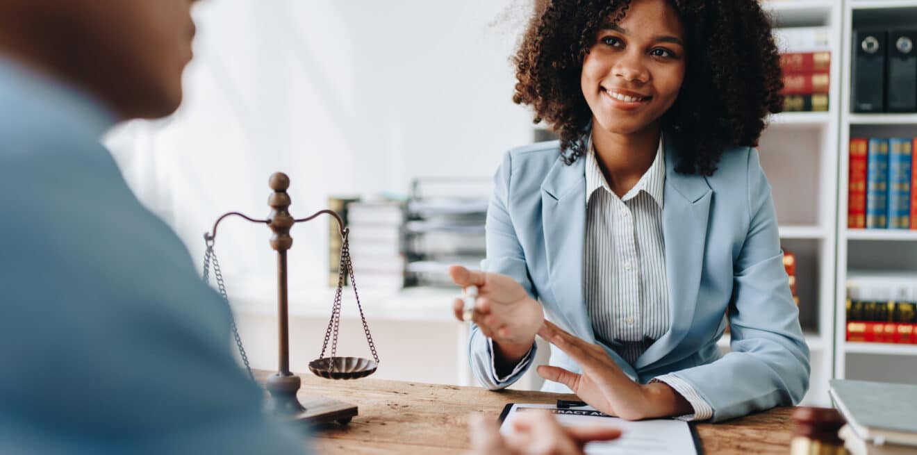 african american attorney, lawyers discussing contract or busine
